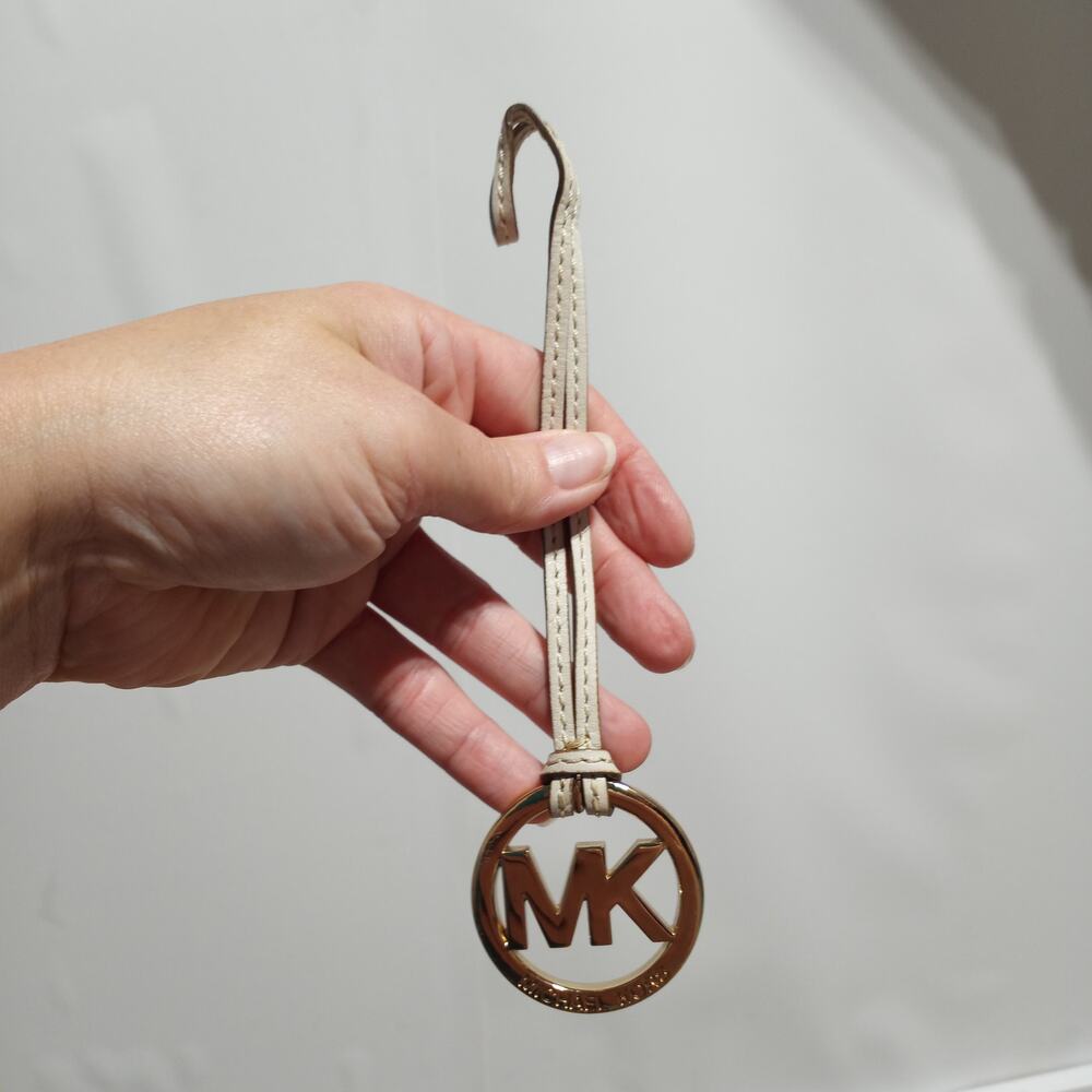 Michael Kors Round Logo Bag Charm Gold With Cream Leather Strap